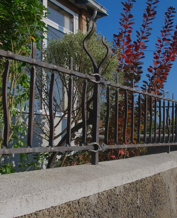 Grille sur Muret